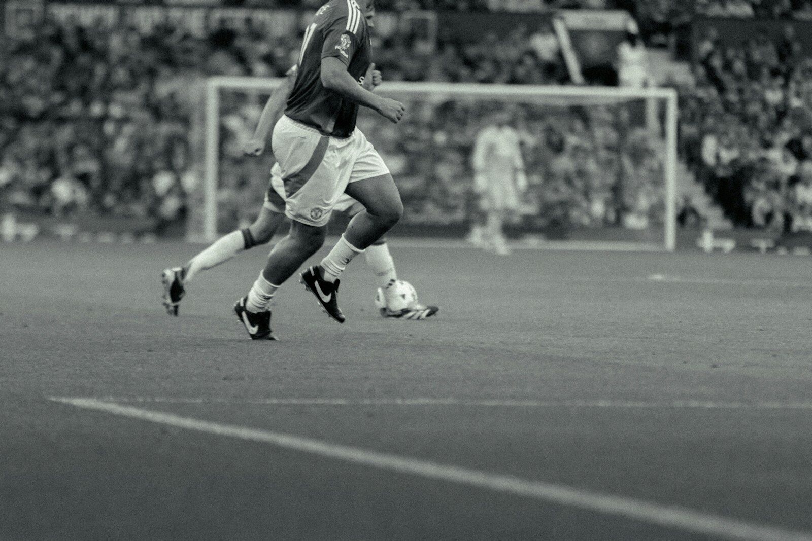 A group of men playing a game of soccer