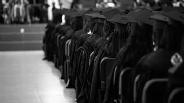 a large group of people in graduation gowns