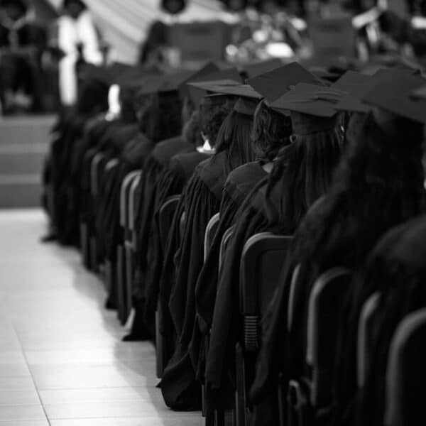 a large group of people in graduation gowns