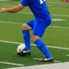 person in blue and white nike soccer jersey