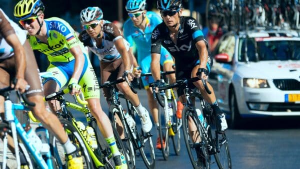 group of cyclist passing through service road