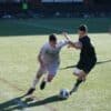 man playing soccer on the field
