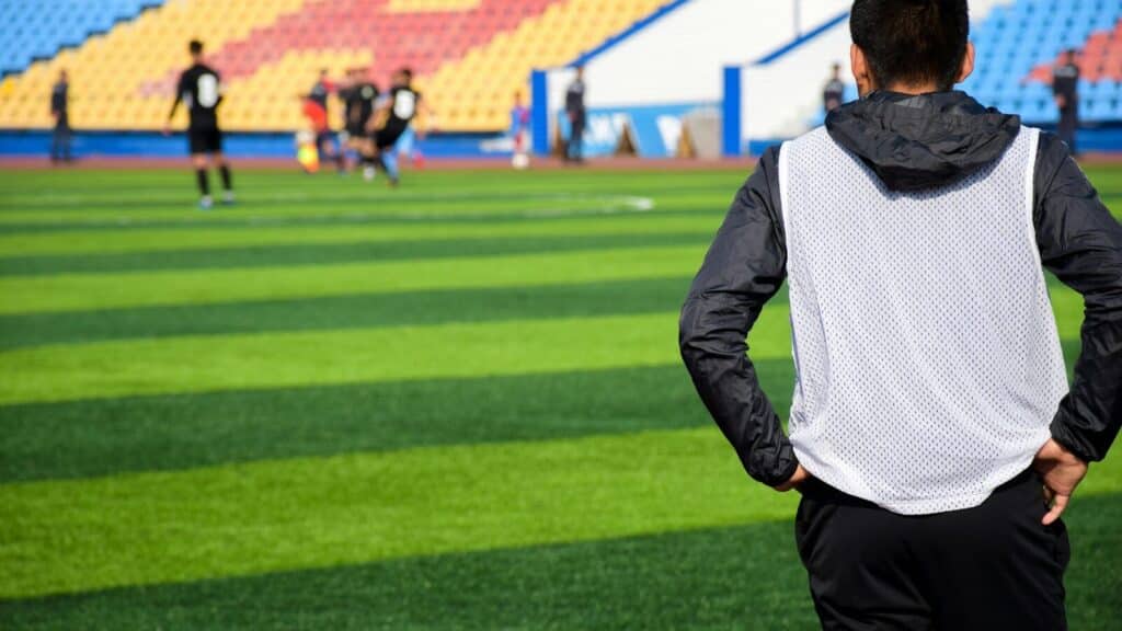 person looking at soccer field