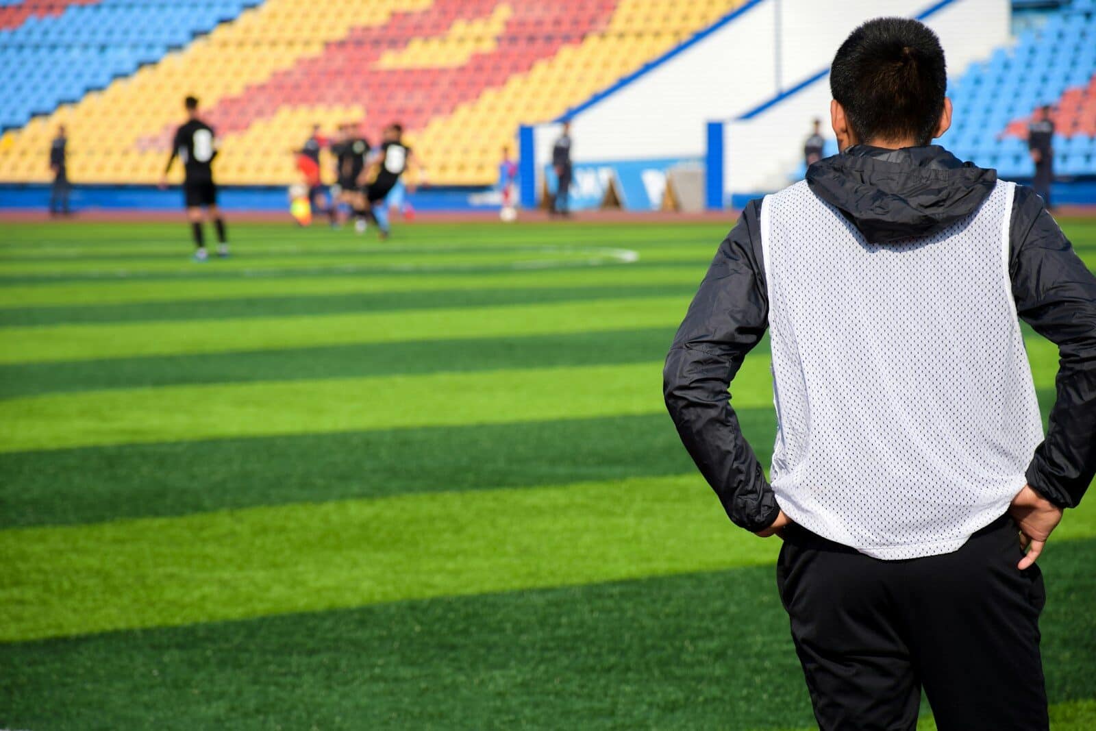 person looking at soccer field